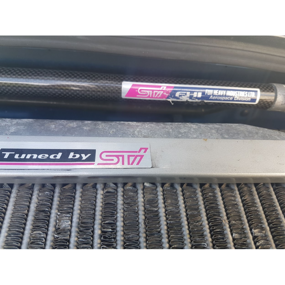 Autocollants TUNED by STI  Autocollants TUNED by STI